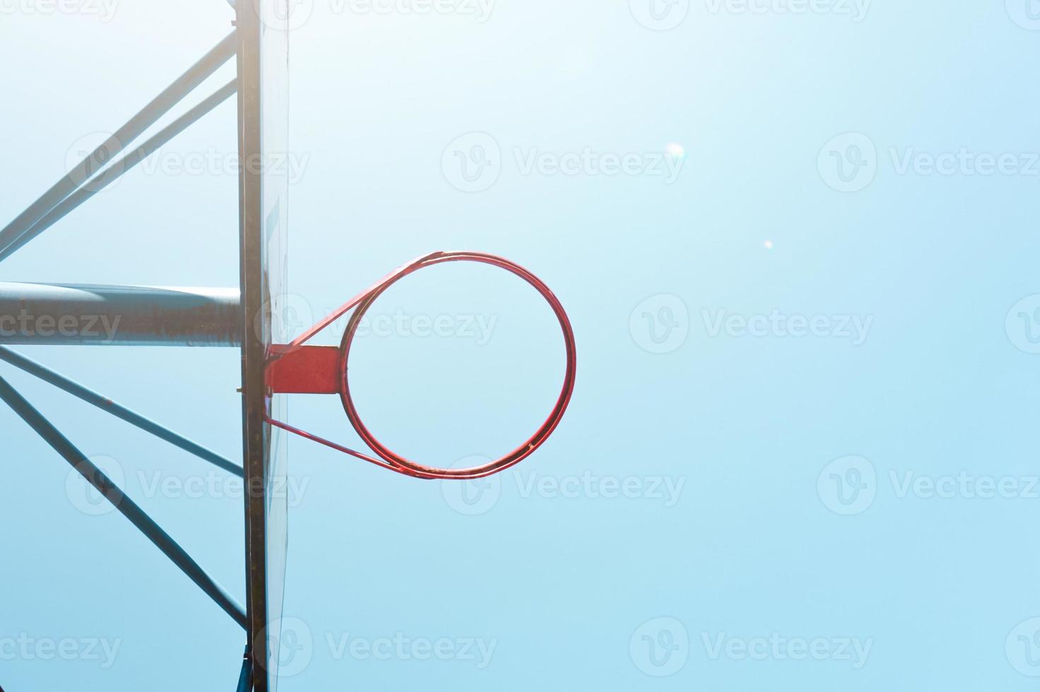 street basketball hoop and blue sky photo