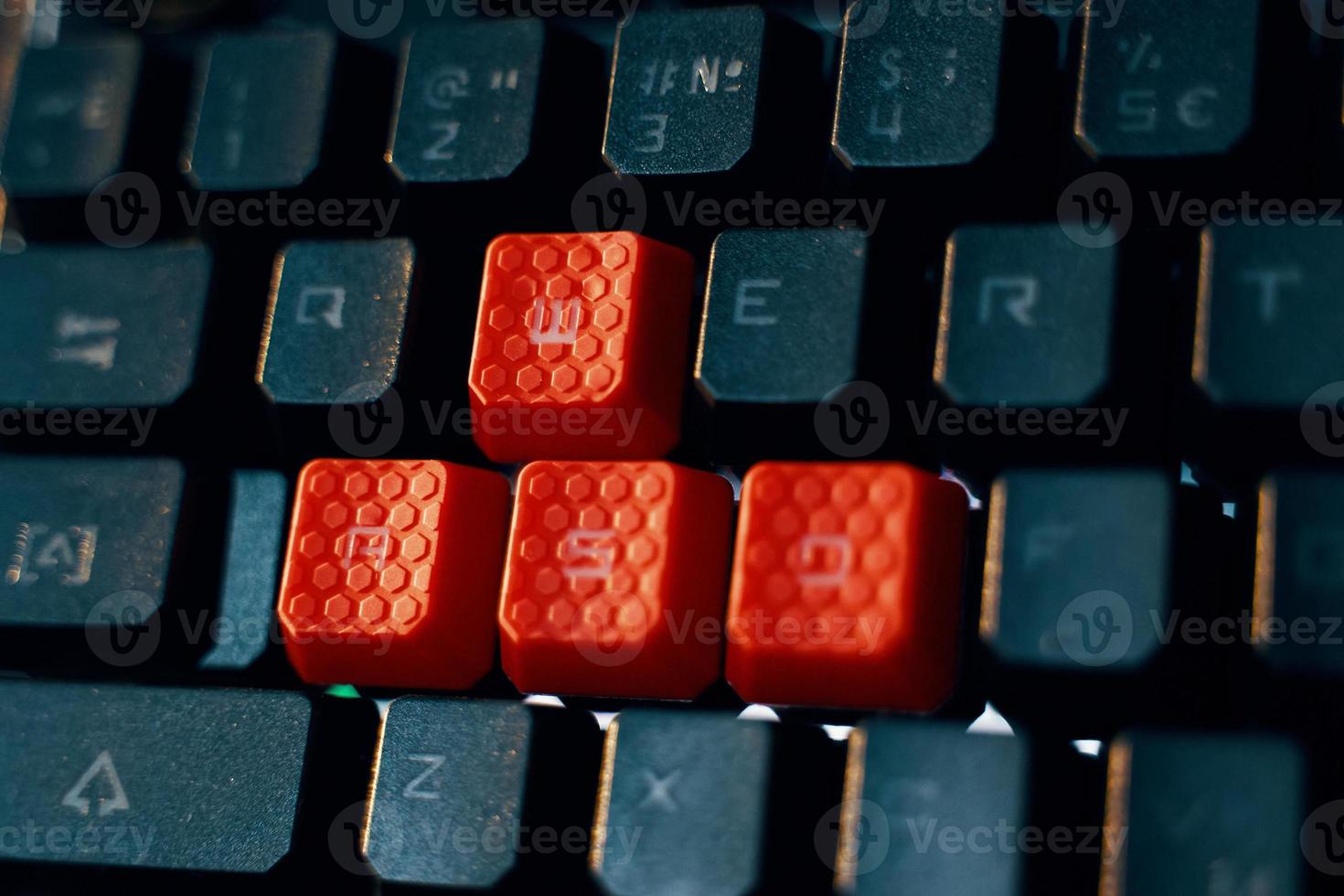 Gaming Keyboard with red WASD keys photo