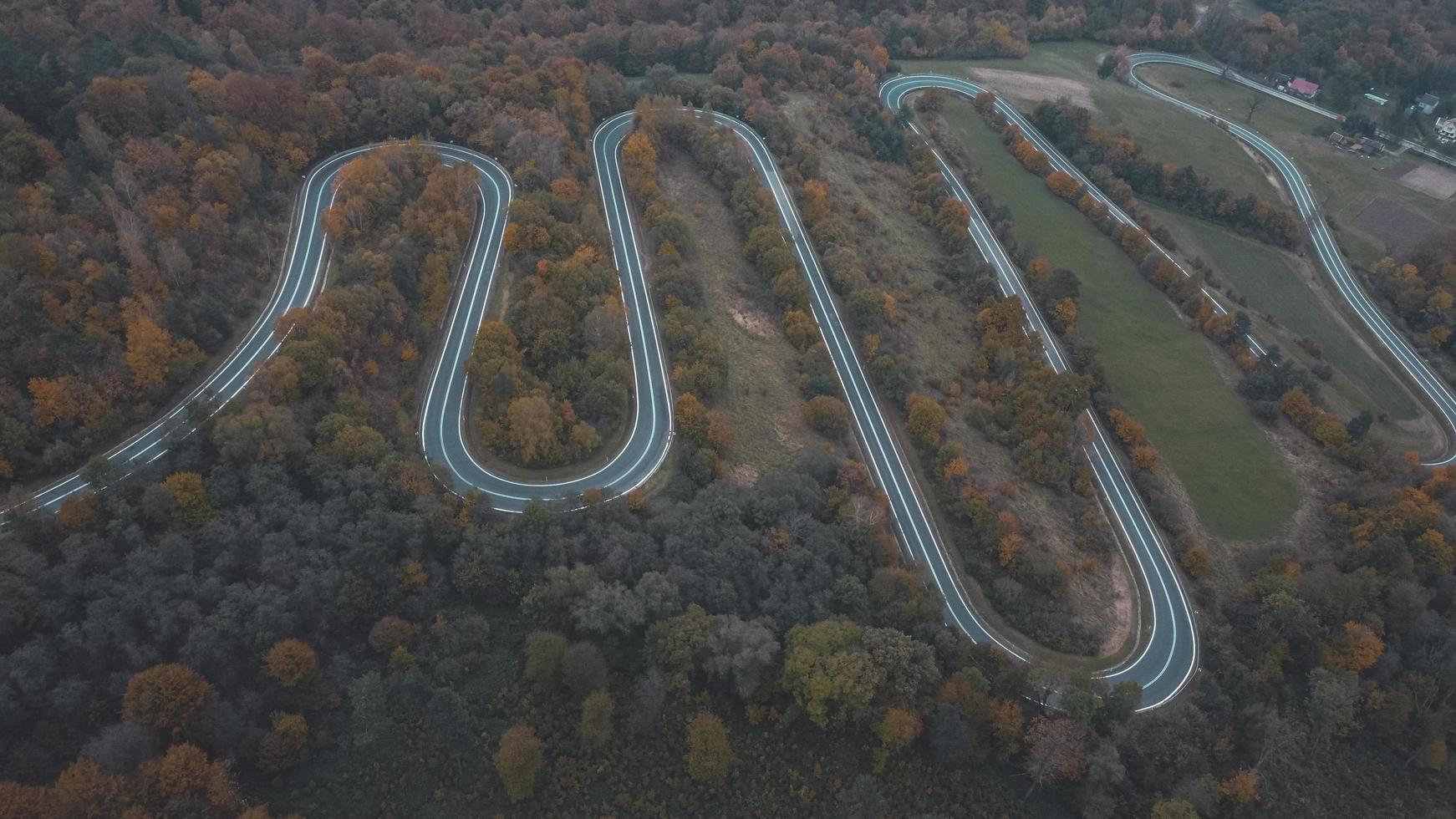 Aerial view of curved road on southern Poland mountains during autumn photo