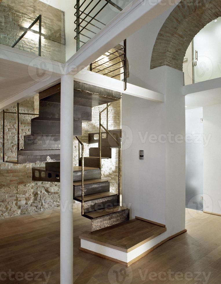 Detail of iron staircase in the modern living room photo