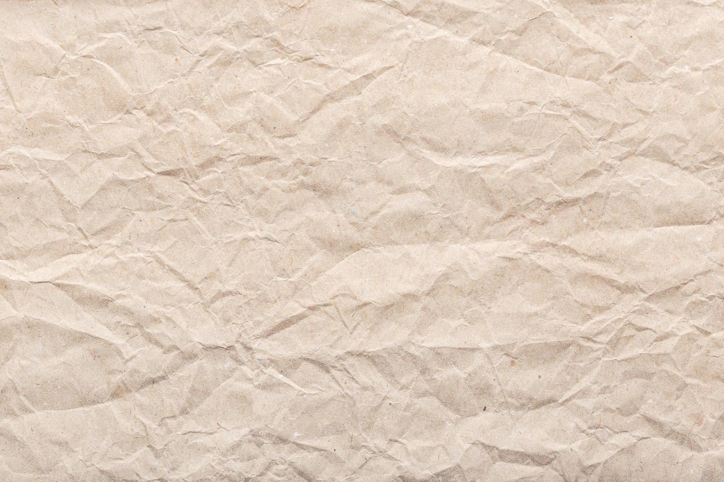 Crumpled paper background texture photo