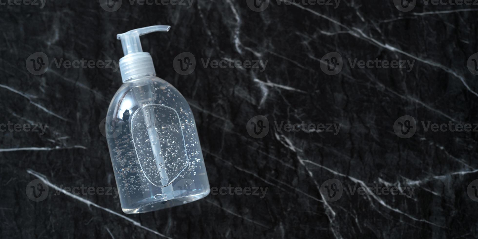 Alcohol Gel Hand Sanitizer on table background photo