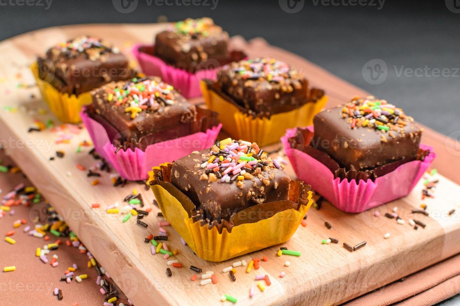 Small cookies with chocolate and peanuts photo