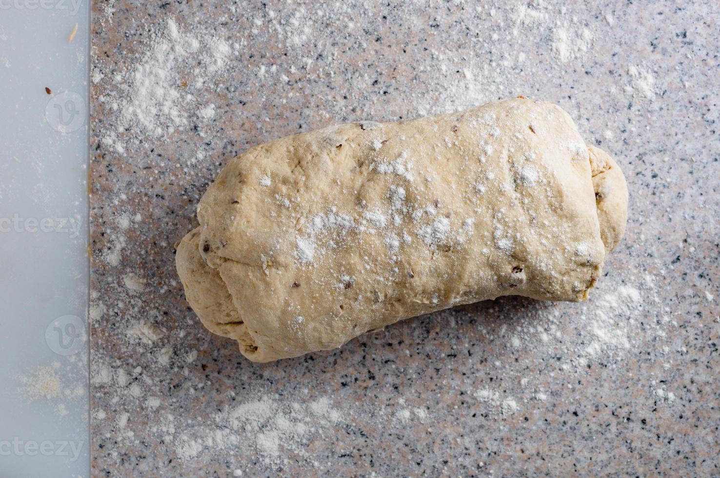 Homemade dough, semisweet dough with raisins, honey and  various seeds photo