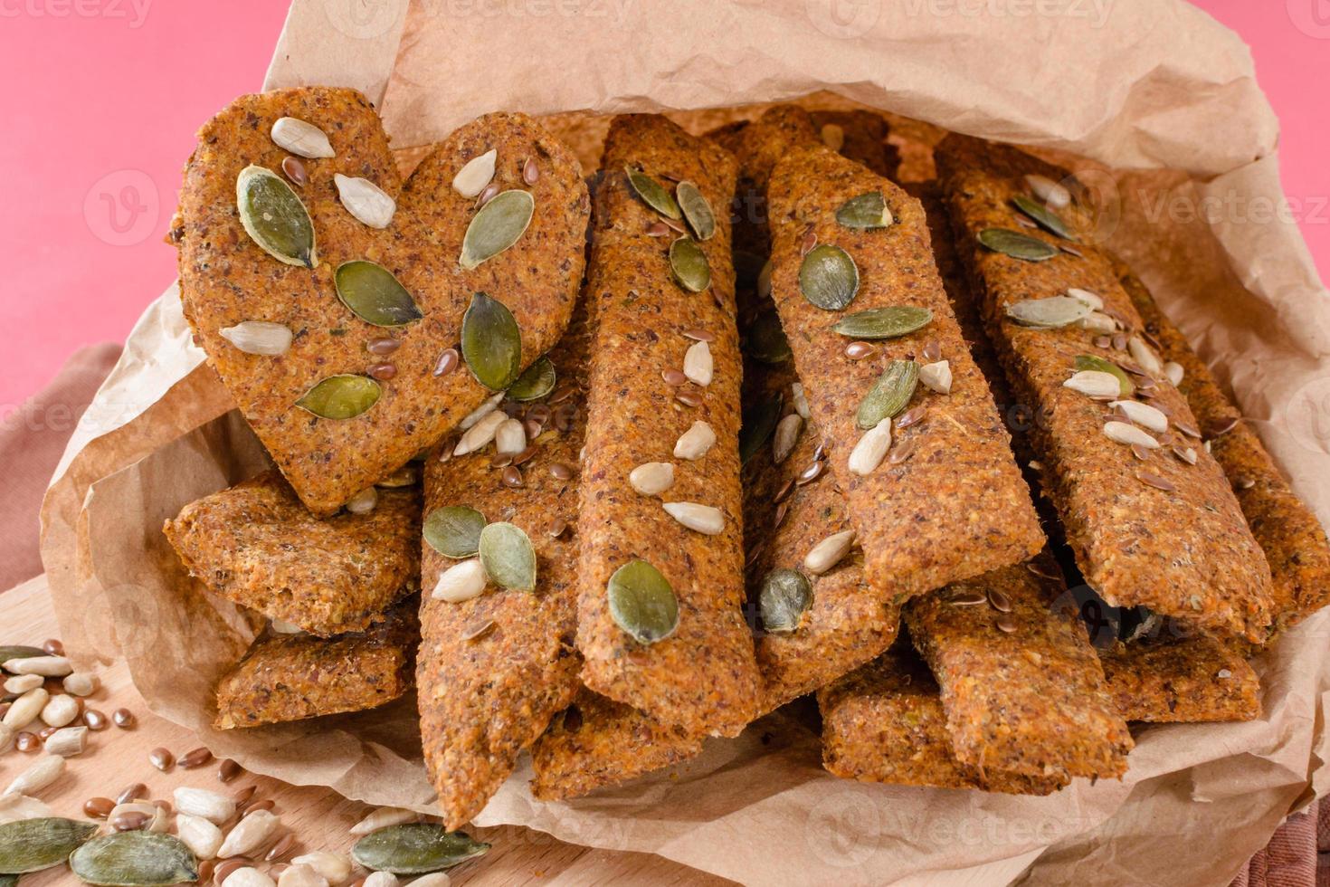 Cereal bars with different seeds. Whole grains bars with honey,a very healthy snack to boost energy. photo