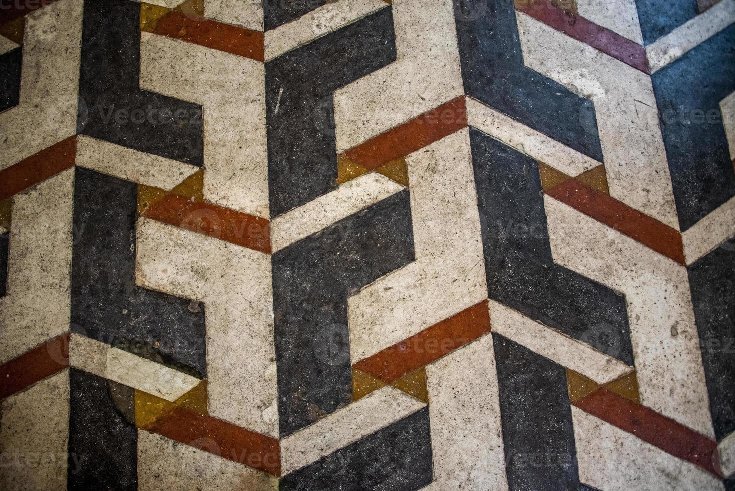 Old red and white geometric flooring photo