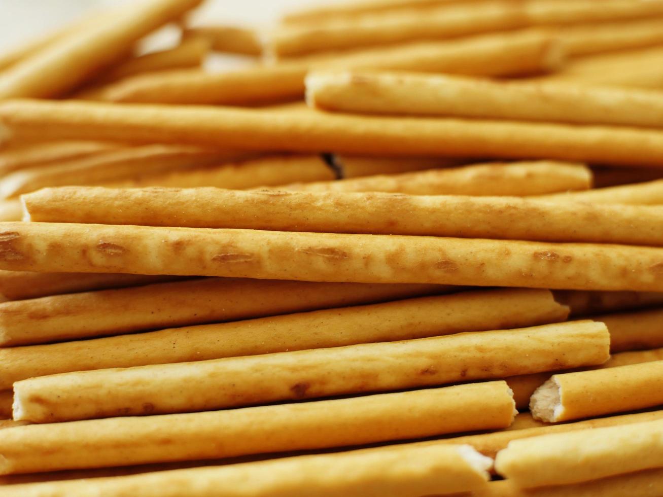 Bread sticks at bakery close-up photo