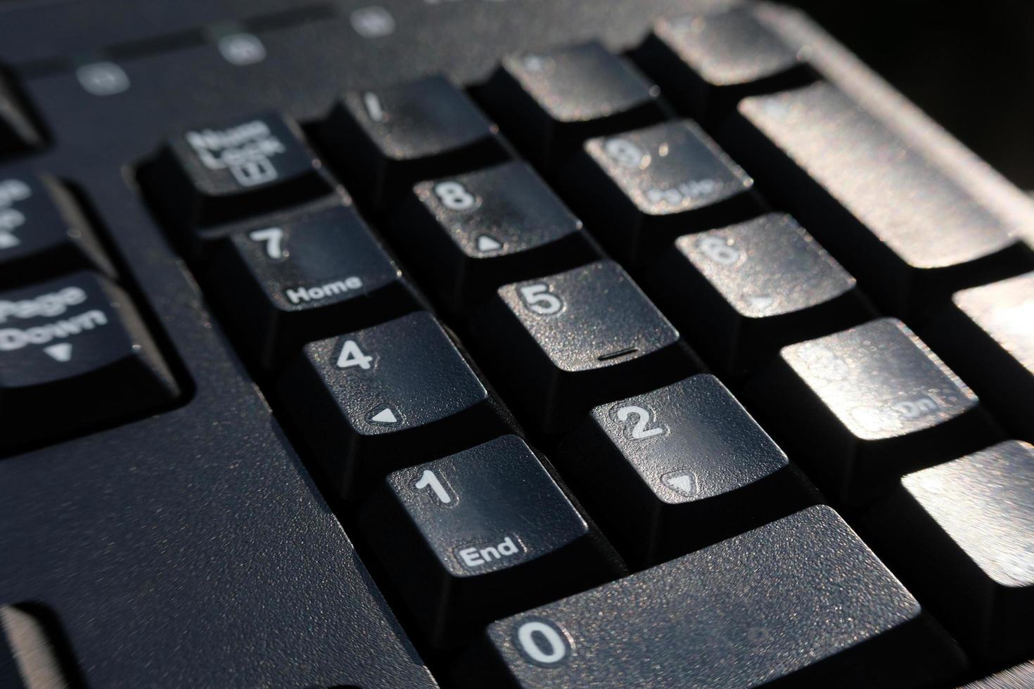 Close up keyboard on table and business concept photo