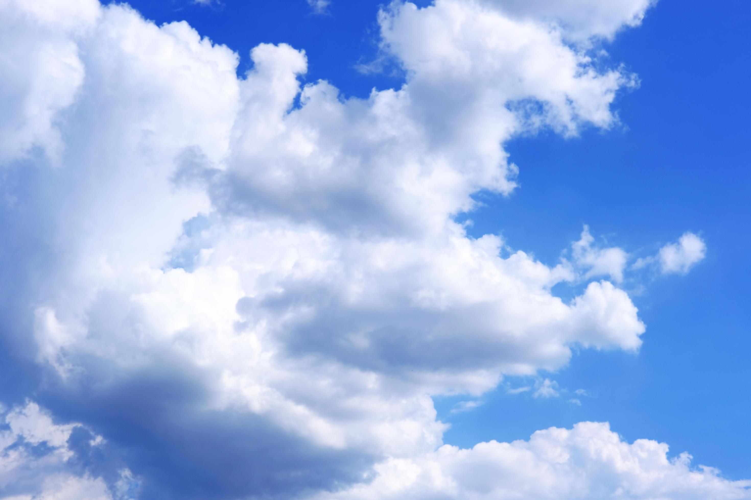 Blue sky and clouds wallpaper background and sunny day 2596200 Stock Photo  at Vecteezy