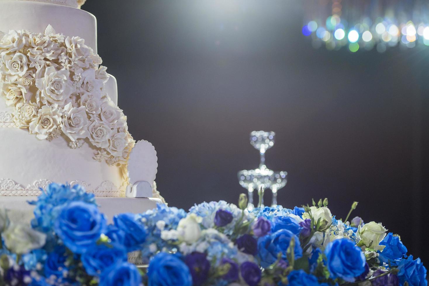 White wedding cake with flower photo