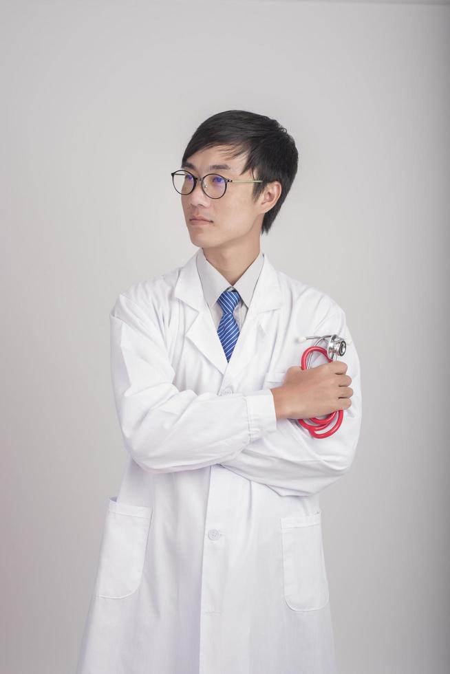 Medicine doctor hand holding stethoscope and working photo