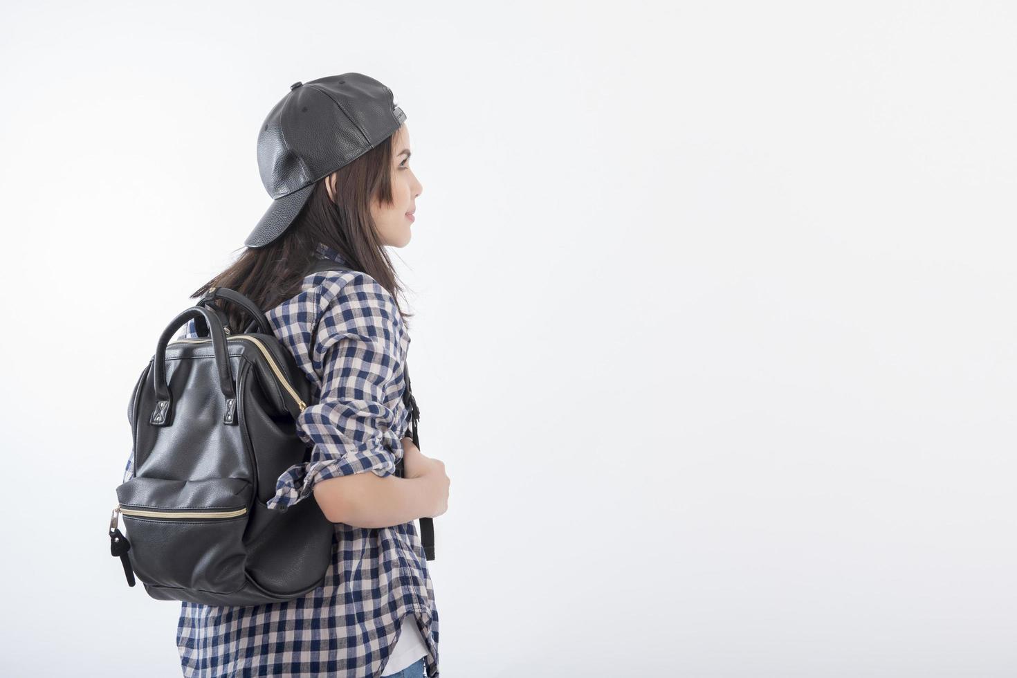Beautiful travel girl isolated on white background photo