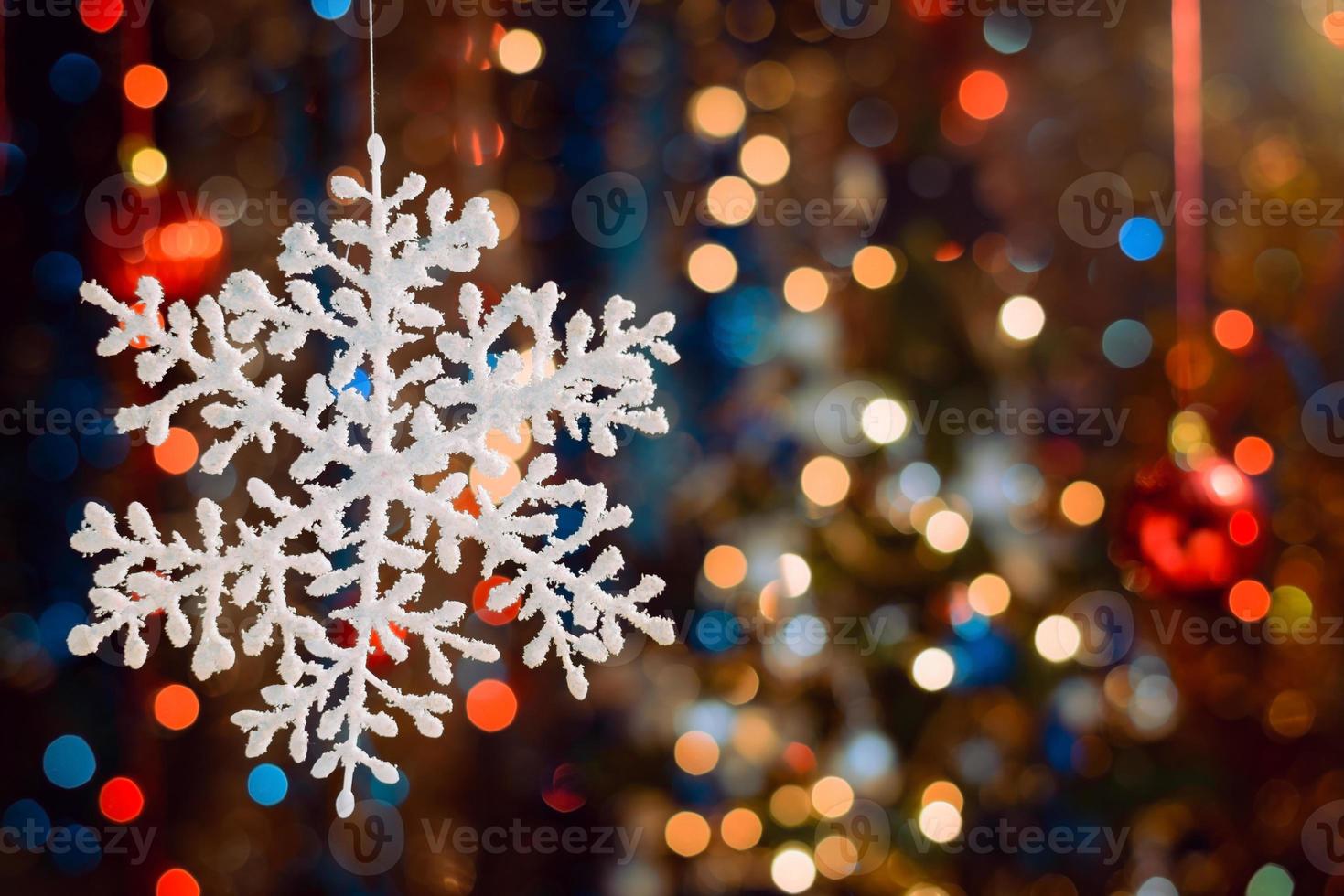 Christmas decorations on bokeh background with out of focus lights photo