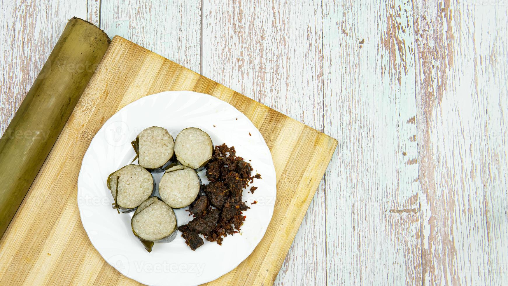 Delicious Delicay Food Lemang and Rendang photo