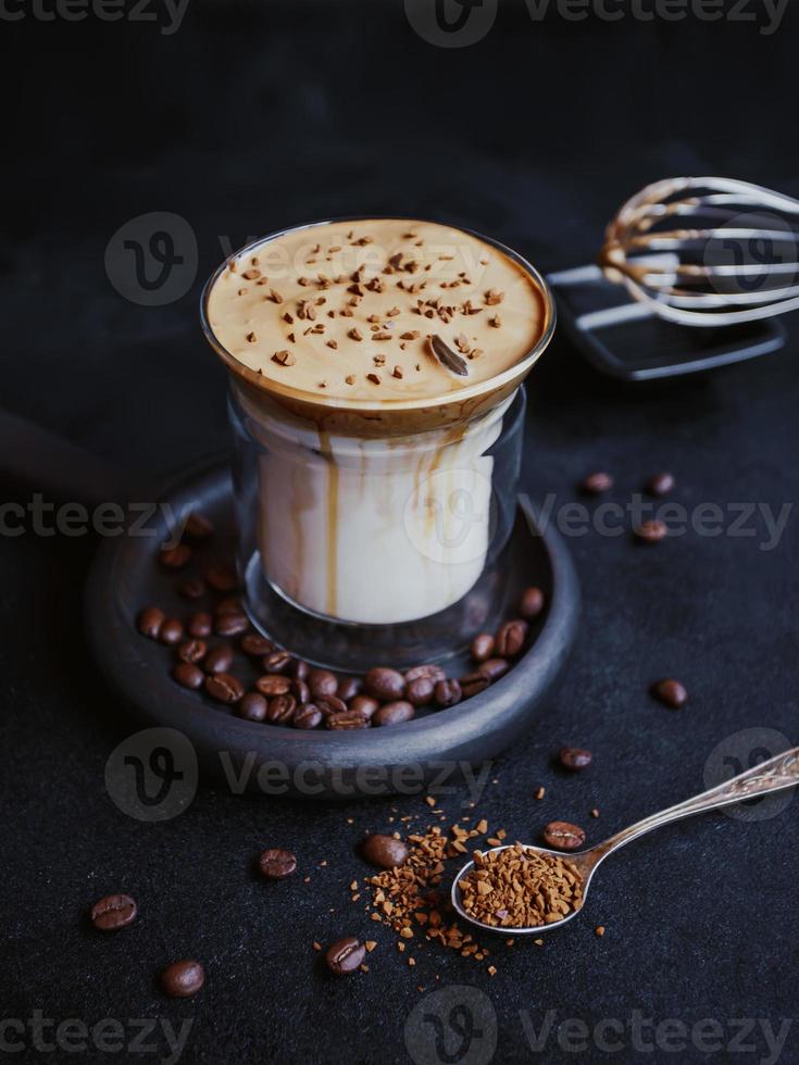 Dalgona Coffee, a trendy cool fluffy creamy whipped coffee. photo