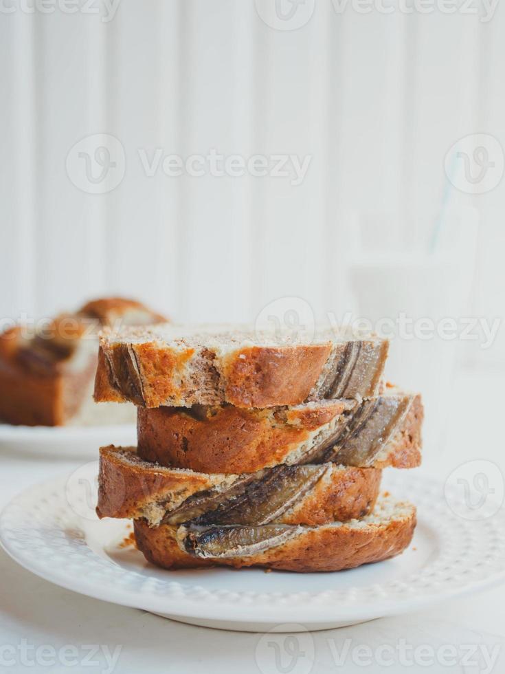 Homemade banana bread with cinnamon and walnuts. photo