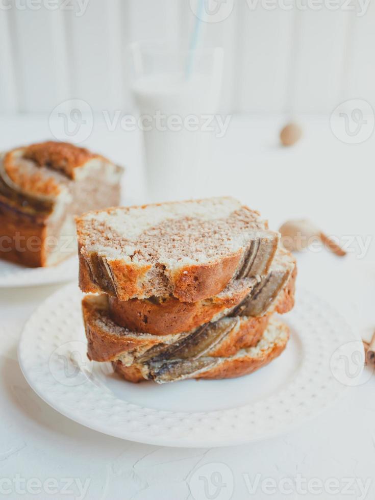 Homemade banana bread with cinnamon and walnuts. photo