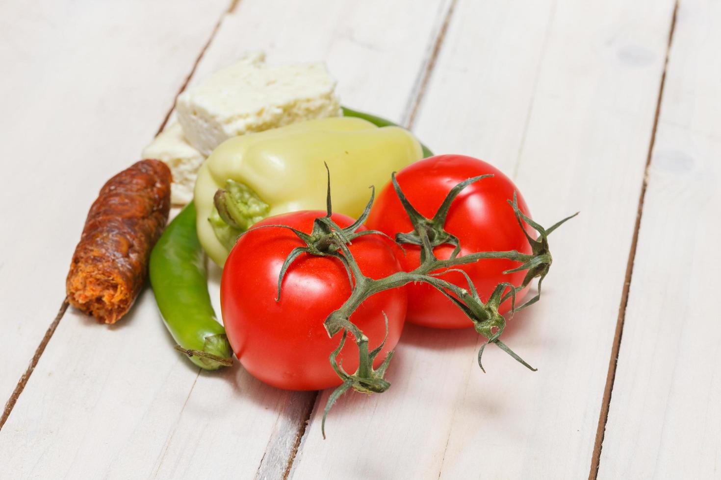 Raw rustic meal farm fresh vegetables cheese and cabbage photo