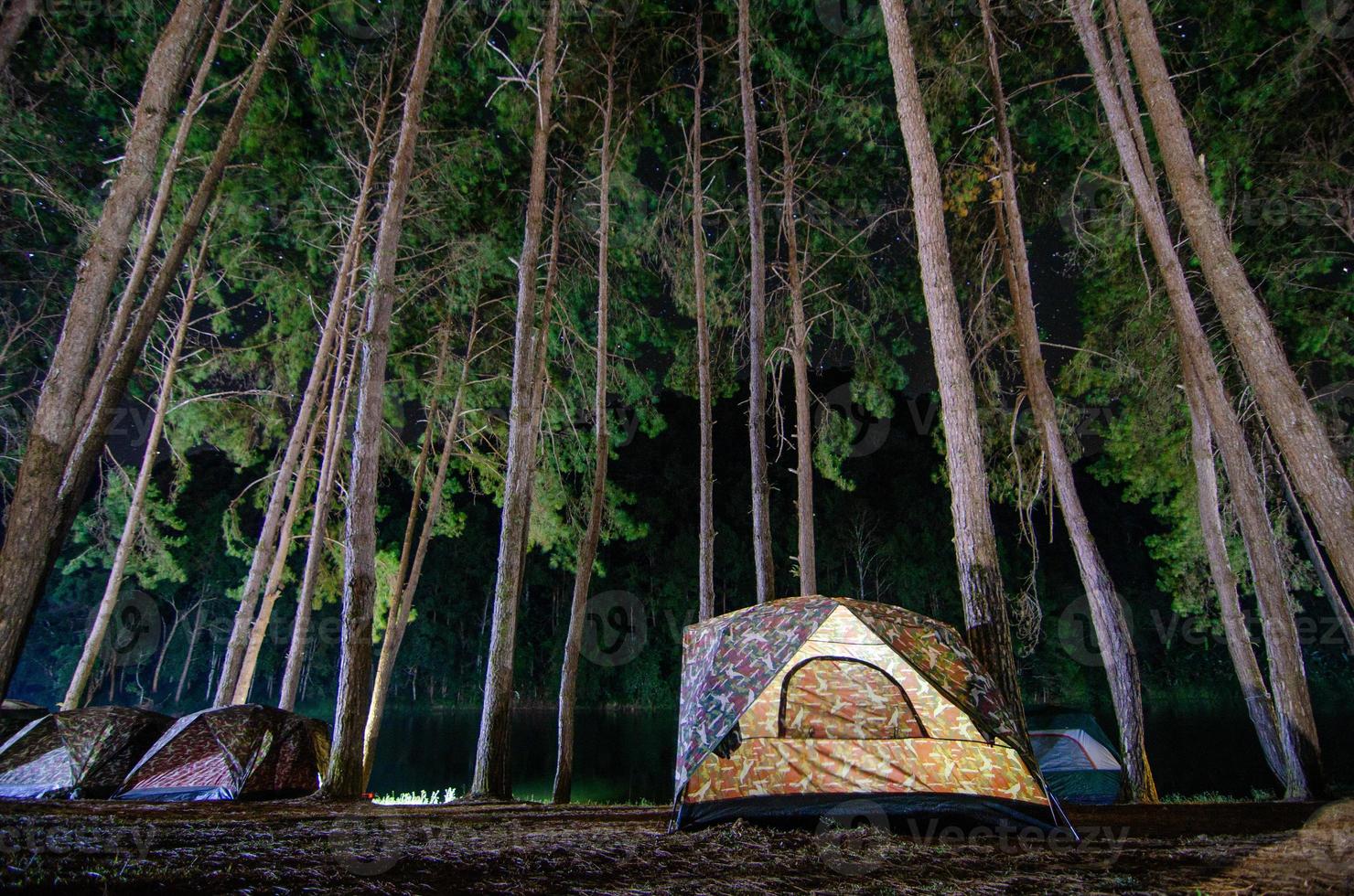 Dancing camping in Pang Ung forest, Mae Hong Son province, Thailand photo