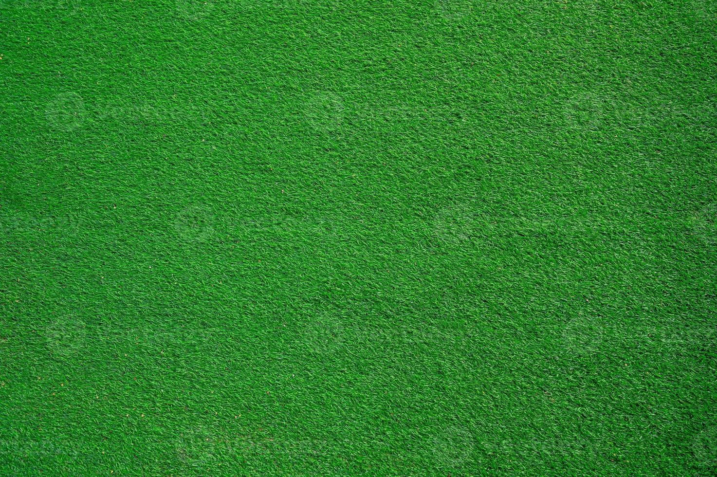 de fondo el campo de césped verde se ve arriba. foto