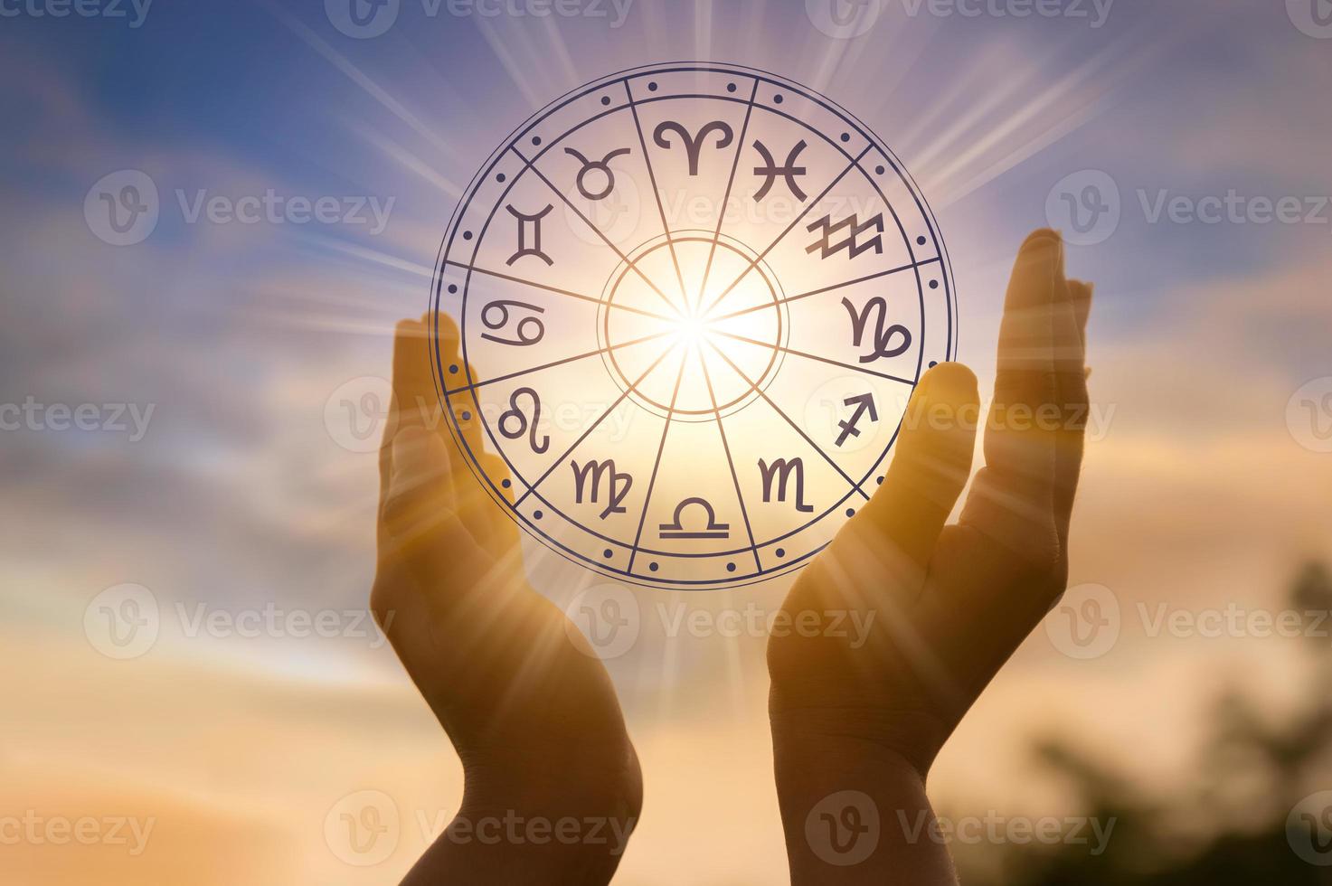 Zodiac signs inside of horoscope circle astrology and horoscopes concept photo