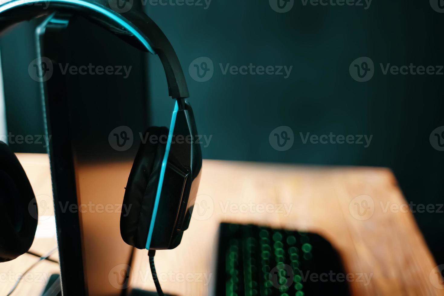 Gaming headphones on monitor in streamer studio photo