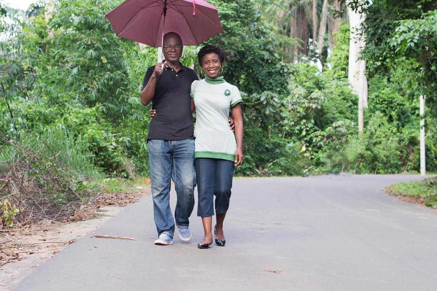 young couple stroll in the countryside photo