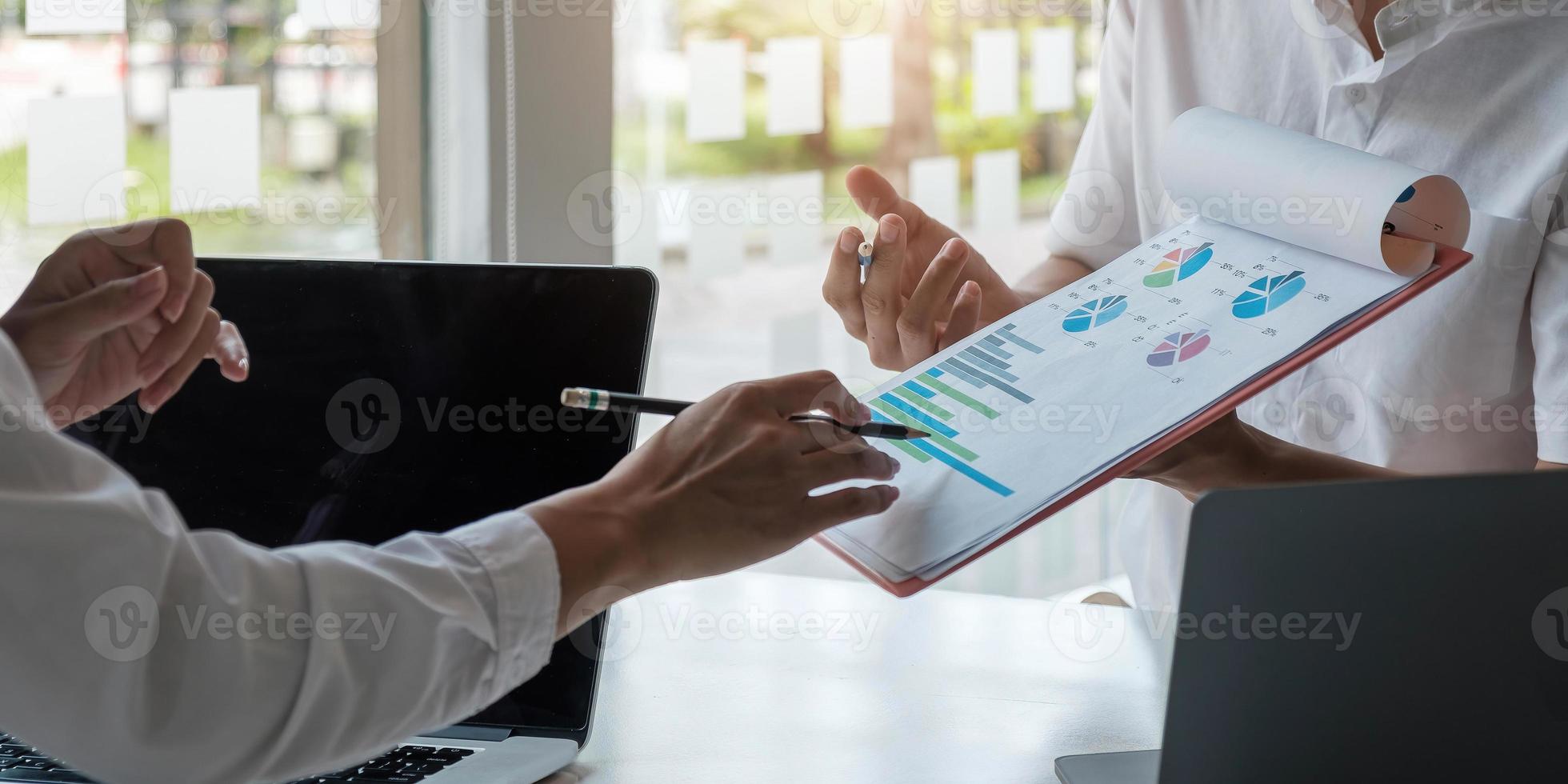 Close up businesspeople meeting to discuss the situation in the market. Business financial concept photo