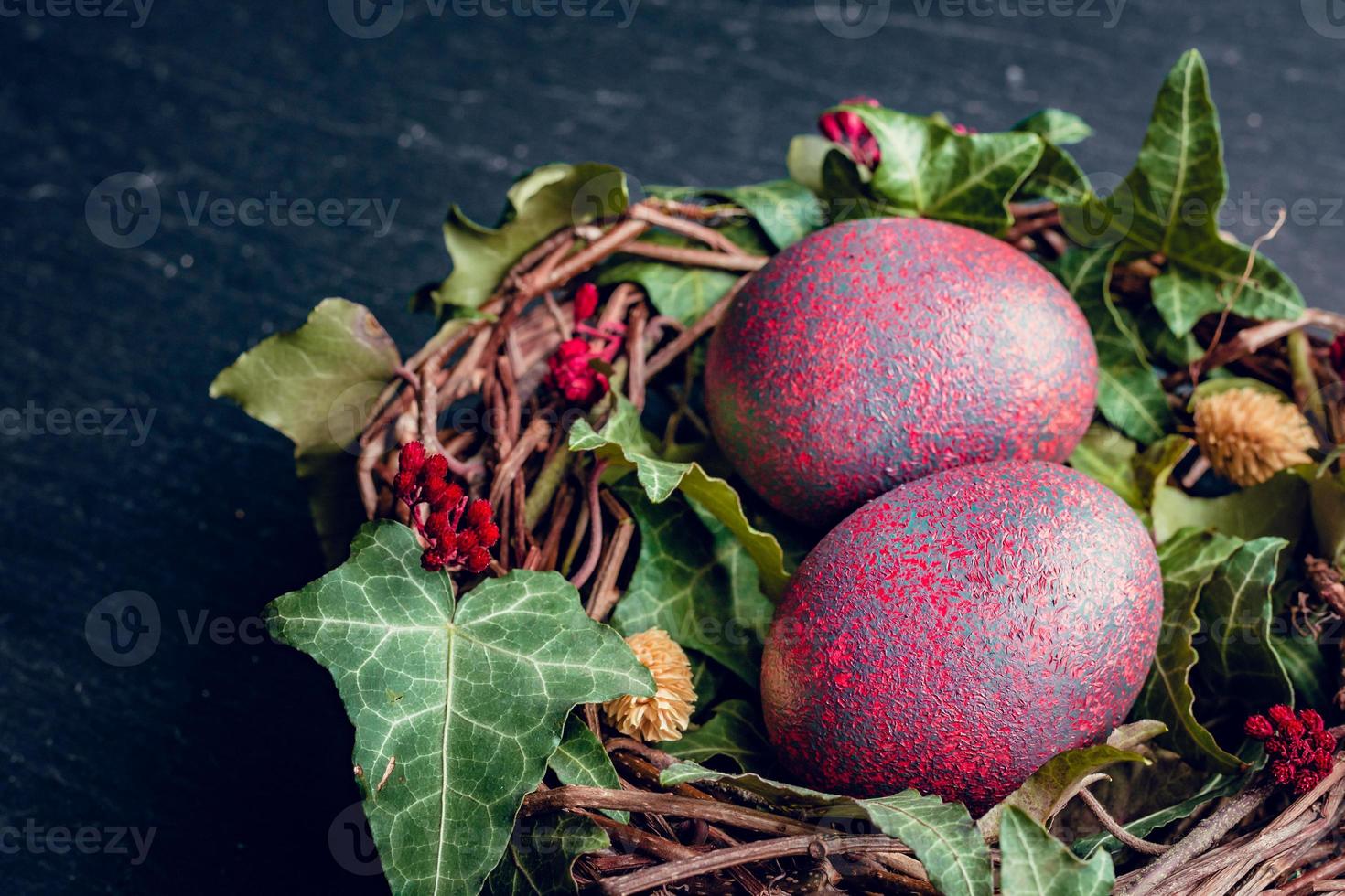 Easter eggs with decoration.Chicken eggs in a birds nest. photo