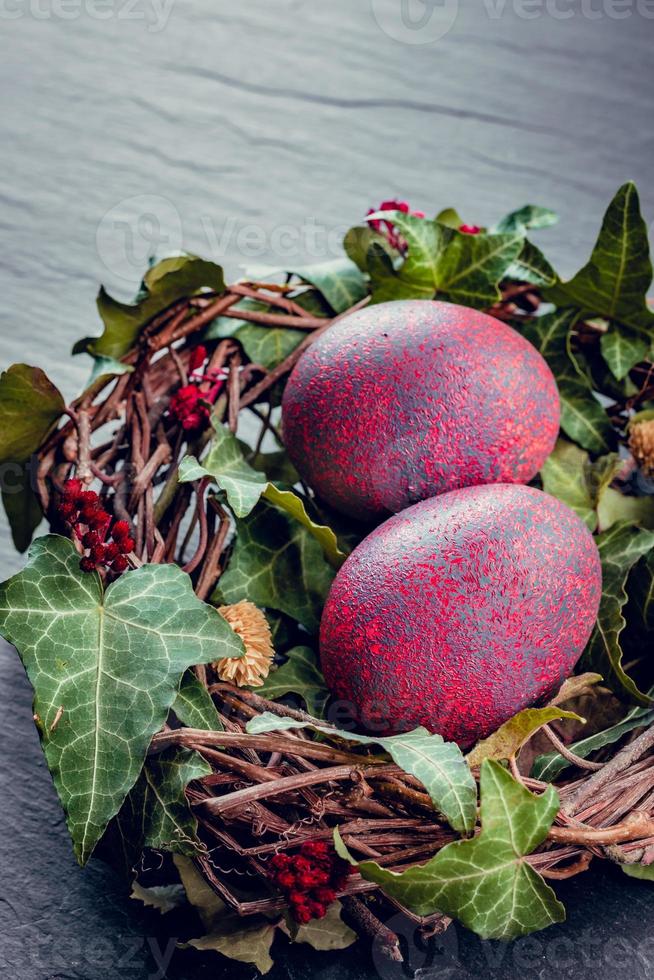 Easter eggs with decoration.Chicken eggs in a birds nest. photo