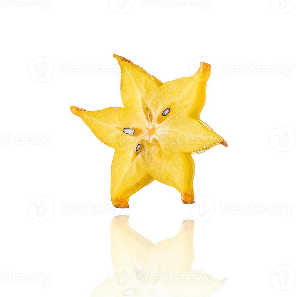 Half of Carambola, star fruit, slice, isolated on white background with drop shadow. photo