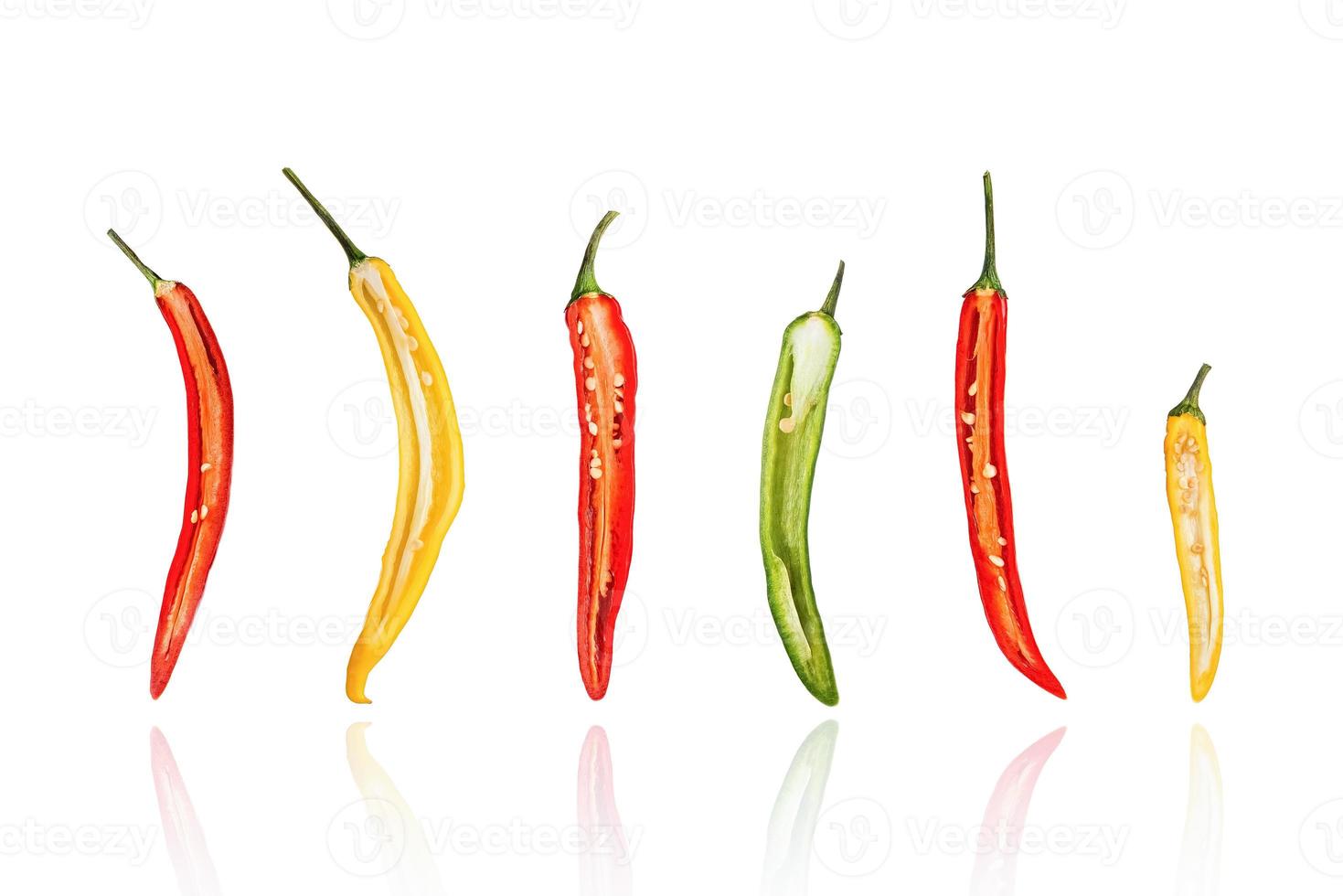 Half of Chili peppers, chillies, slice, isolated on white background with drop shadow. photo