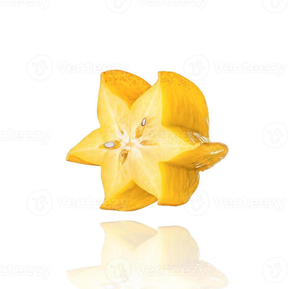 Half of Carambola, star fruit, slice, isolated on white background with drop shadow. photo