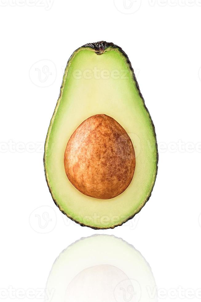 Half of Avocado fruit, slice, isolated on white background with drop shadow. photo
