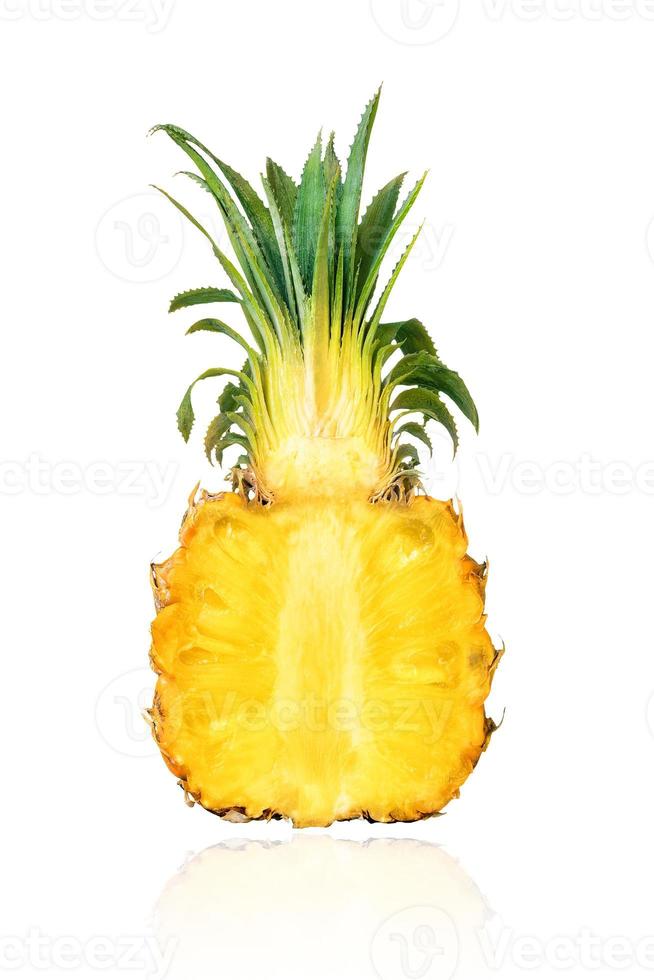 Half of baby pineapple, slice, isolated on white background with drop shadow. photo