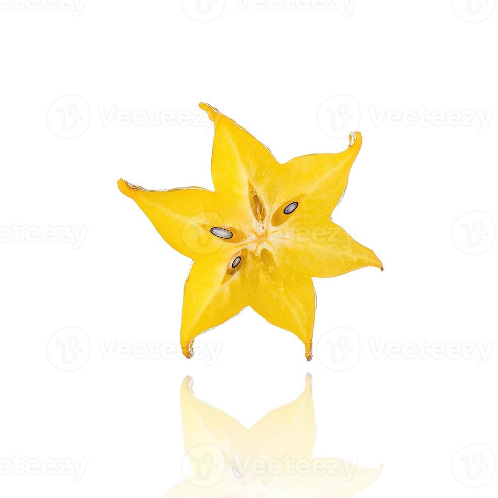 Half of Carambola, star fruit, slice, isolated on white background with drop shadow. photo