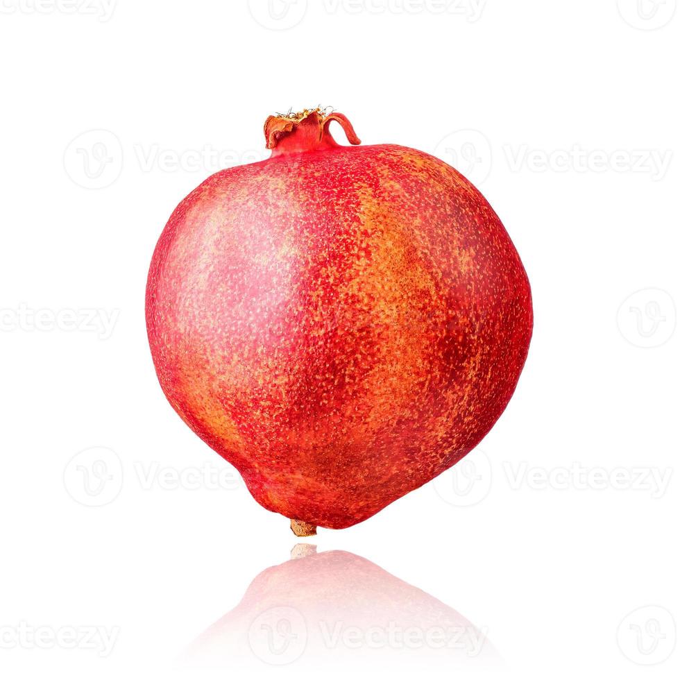 Pomegranate fruit isolated on white background with drop shadow. photo