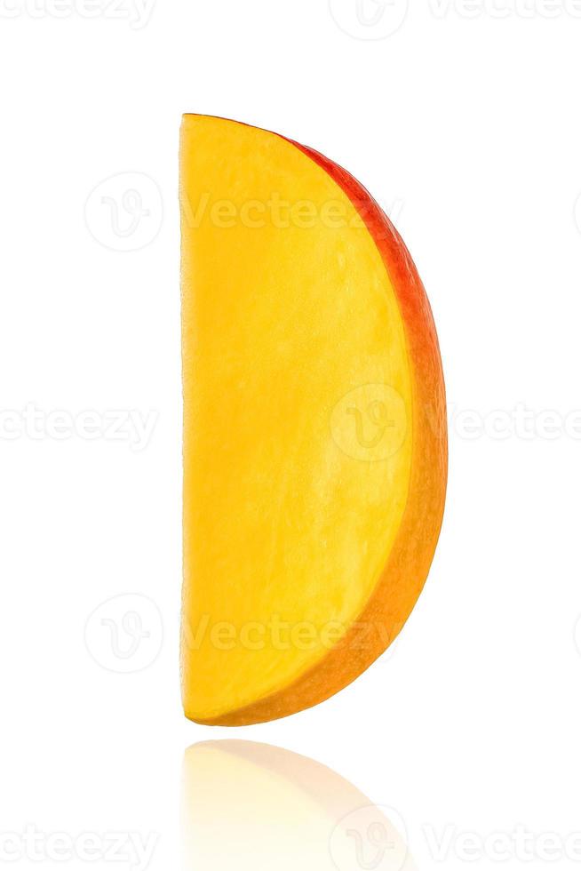 Piece of mango, slice, isolated on white background with drop shadow. photo