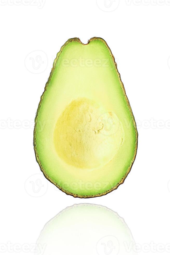 Half of Avocado fruit, slice, isolated on white background with drop shadow. photo