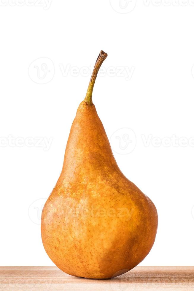 Williams or Bartlett pears on wooden table with isolated white background. photo