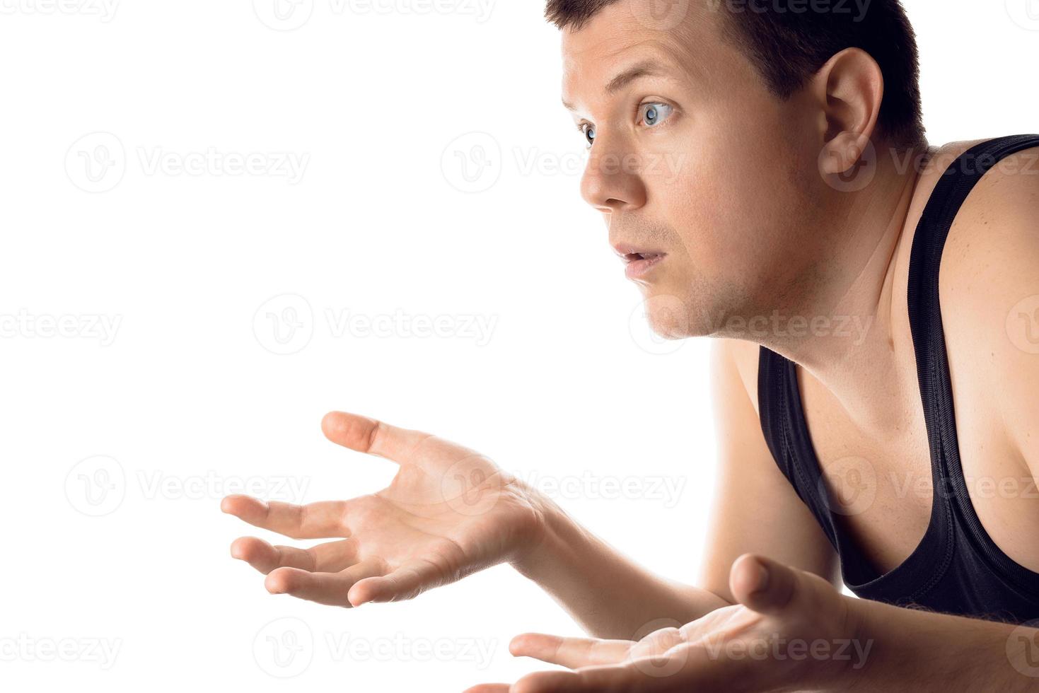 Confused upset young man looking at the side. Human emotion, reaction, expression. Isolated on white background. photo