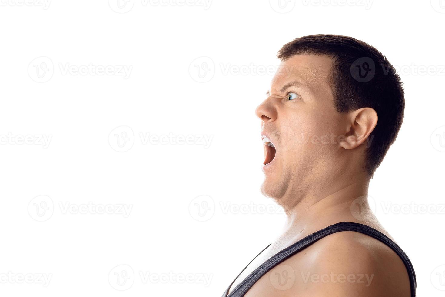 Anxious upset young scared man looking at side. Human emotion, reaction, expression. Isolated on white background. photo