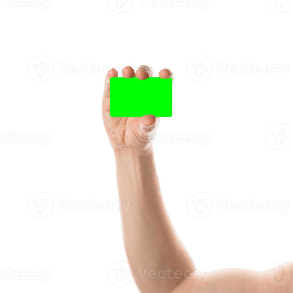 Male hand holds a credit card or business card. Isolated with chroma key and all isolated on white background. photo