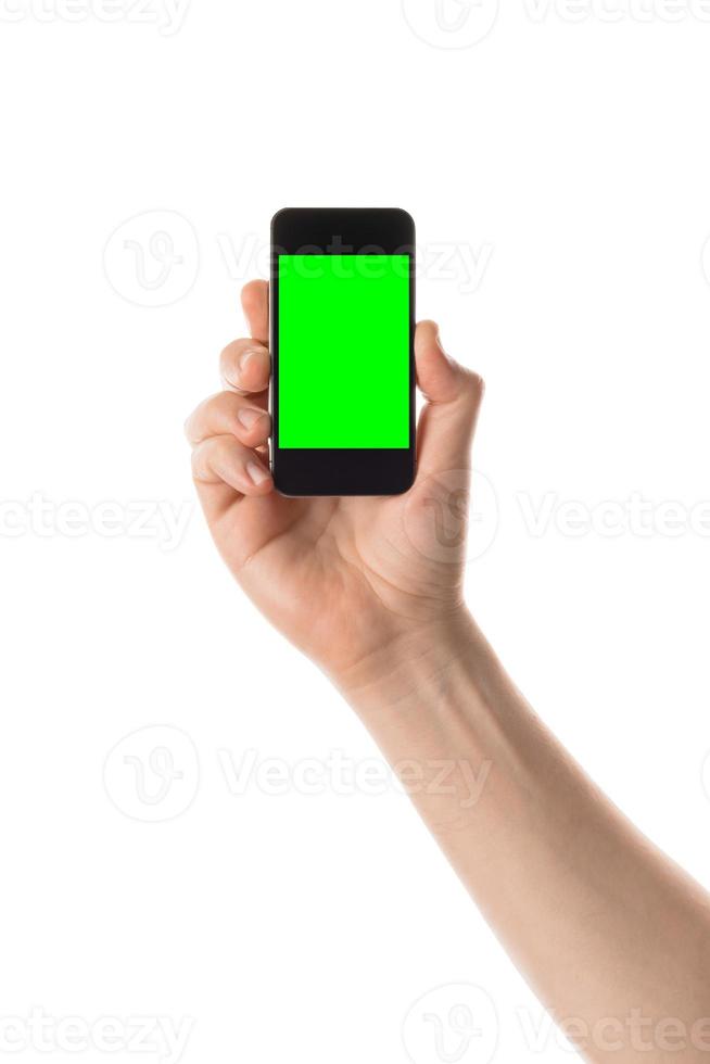 Male hand holds black smartphone. Isolated screen with chroma key and all isolated on white background. photo