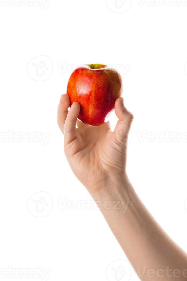 Man holding one red apple in his hand. Isolated on white background. photo