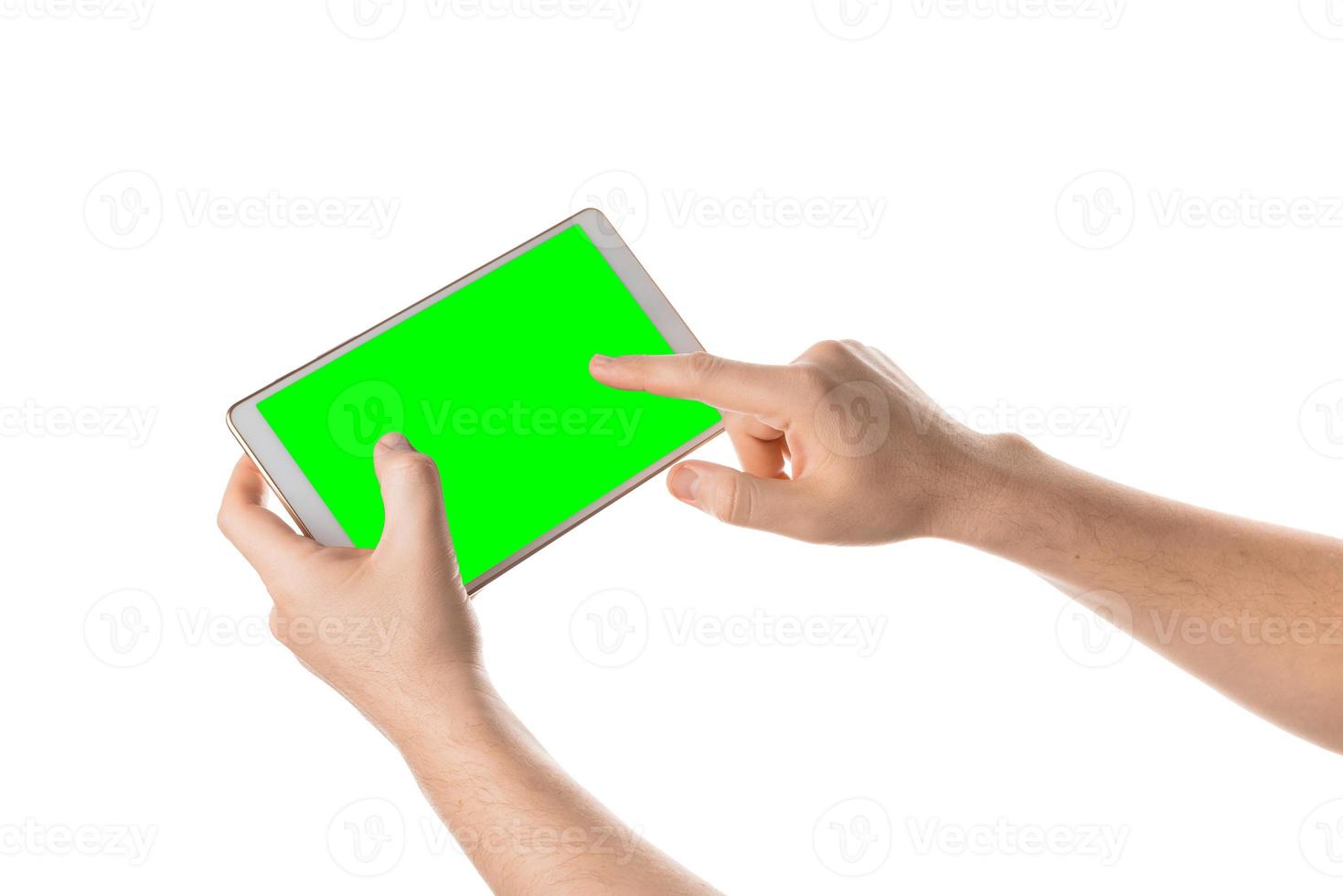 Man hold and touching the blank screen on the white tablet. Isolated screen with chroma key and all isolated on white background. photo