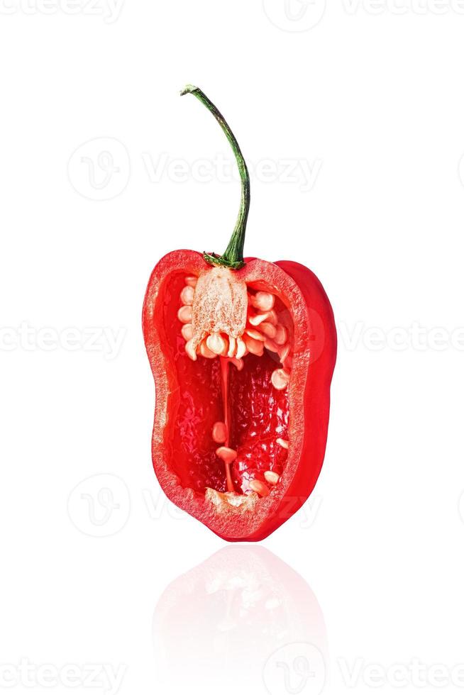 Half of red Habanero pepper, slice, isolated on white background with drop shadow. photo