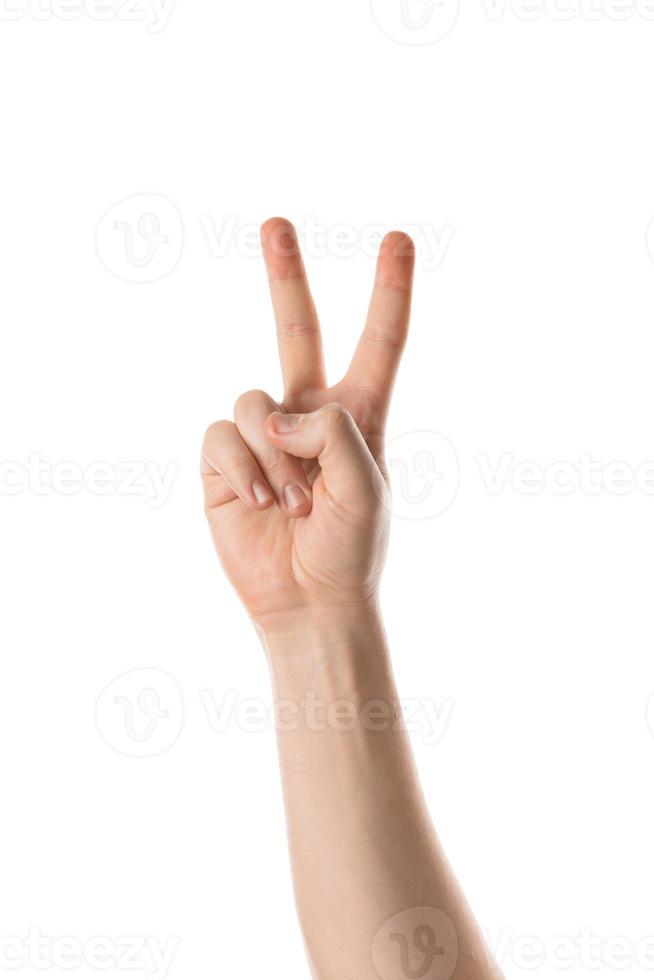Man showing a numbers with a hand gesture. Isolated on white background. photo