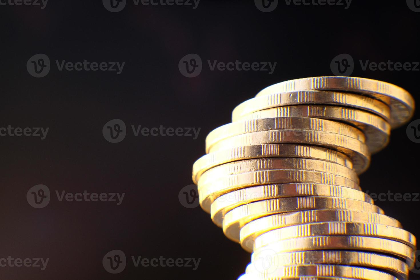 saving money concept, stacking coins on table background, Advertising coins of finance and banking, macro coins photo