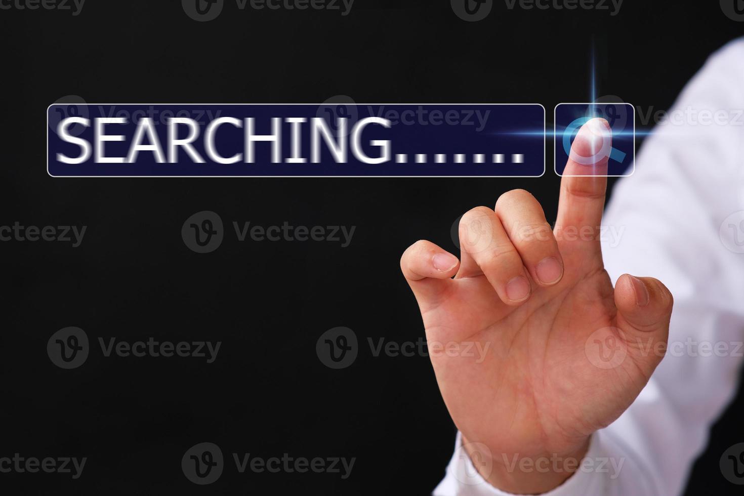 man hand using computer pc to search the internet, Searching engine with blank search bar photo